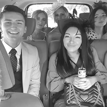 This is a photo of passengers riding in a van.